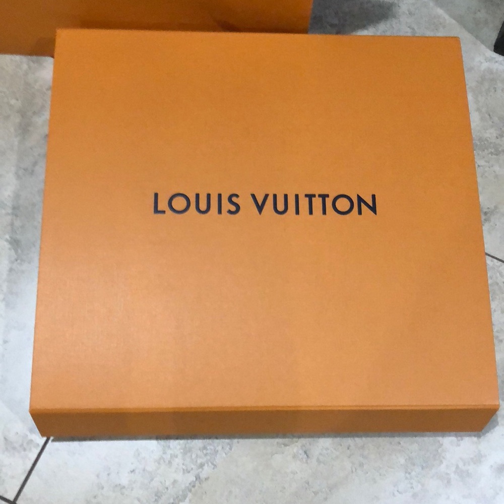 1 box with blue ribbon